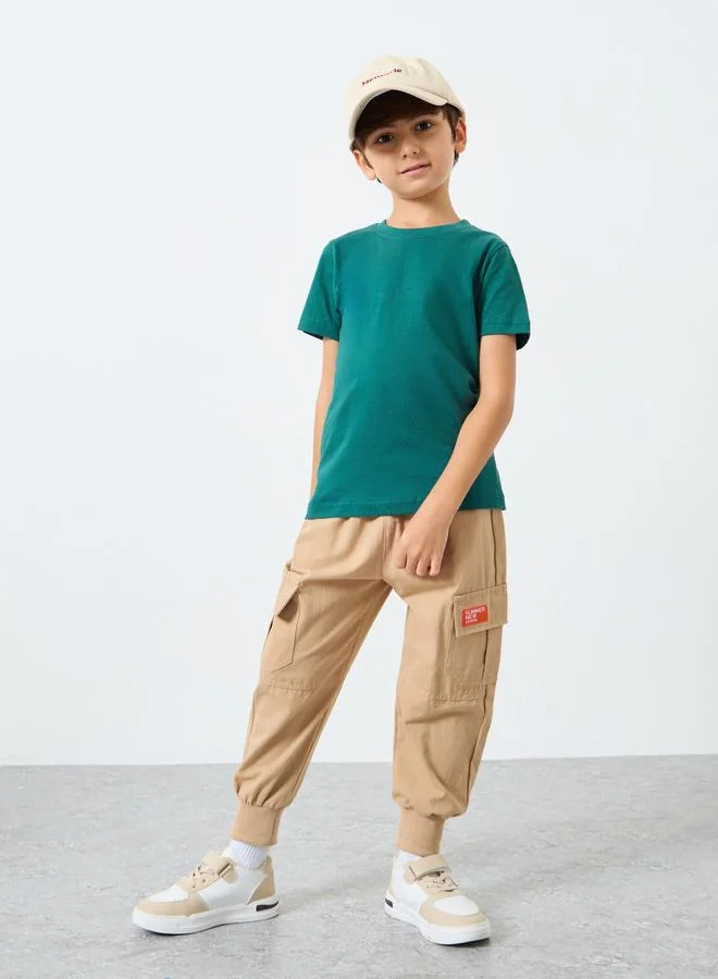 ستايلي تيشيرت قطني بأكمام قصيرة وياقة دائرية